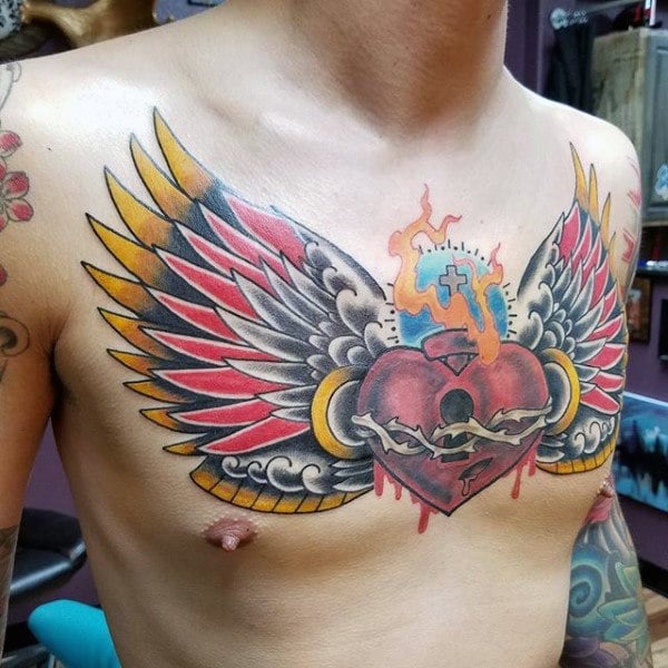 tatuaggio ali sul petto 37